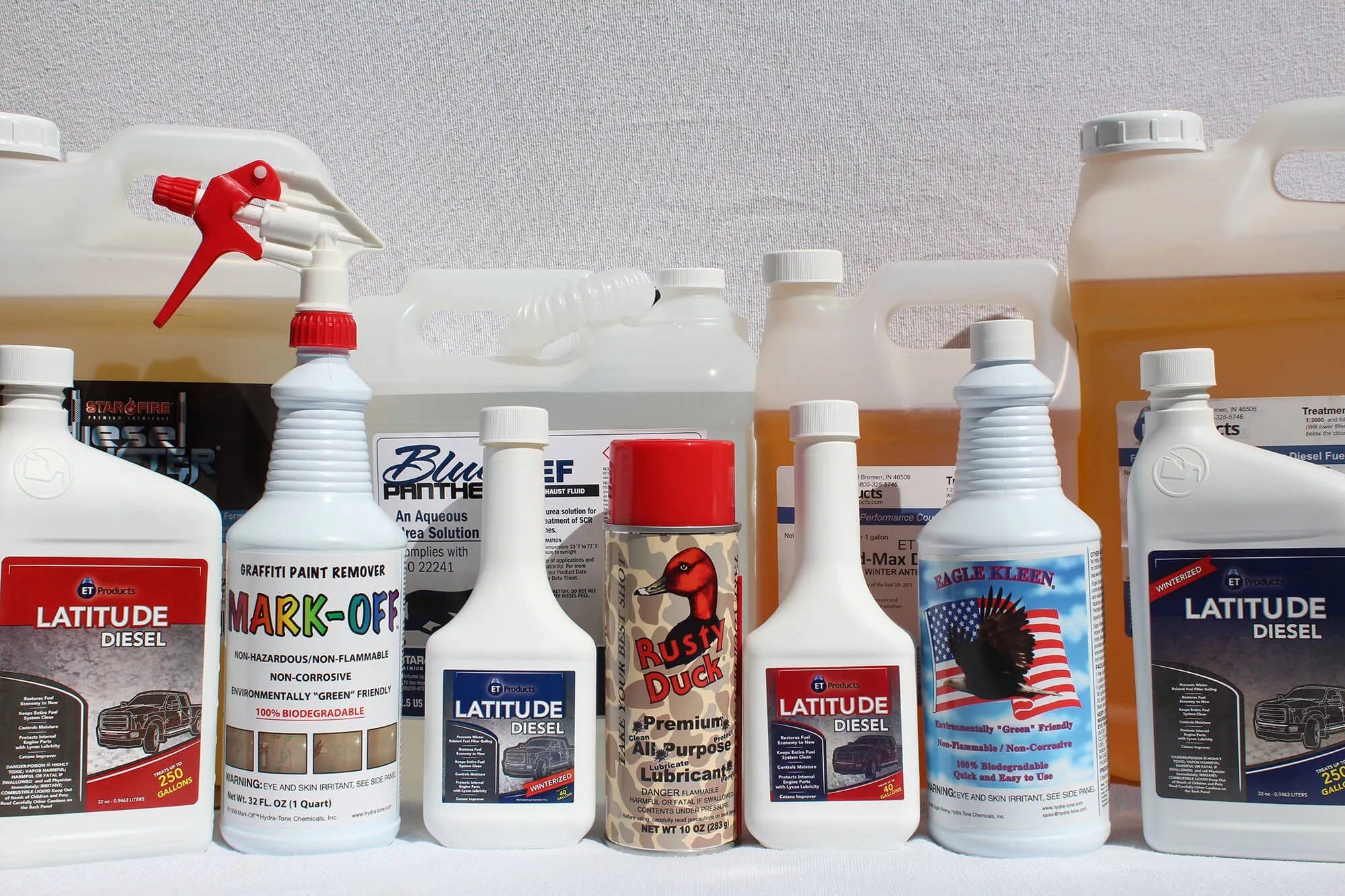 A lineup of automotive fluids and cleaning products blended and packaged by Fleetchem